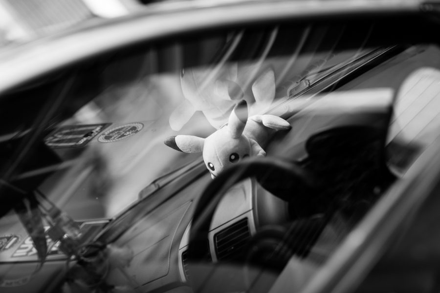 Pikachu toy nestled on a car dashboard in Kuala Lumpur Malaysia