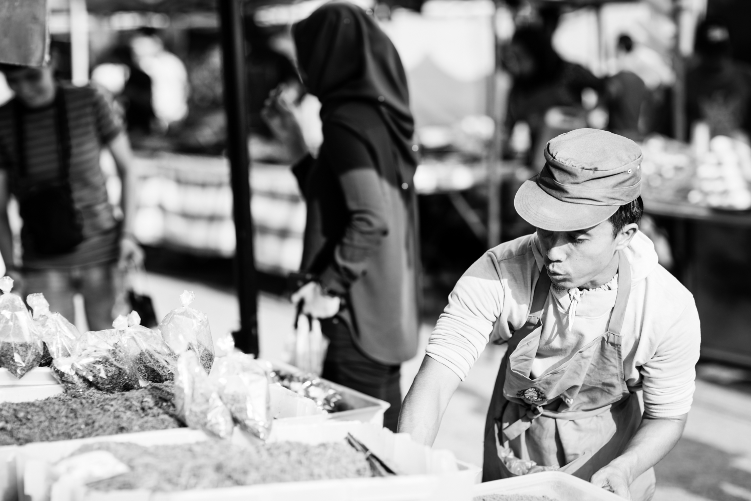 Street food vendor packaging his snacks for sale, Taman Tun Dr Ismail (TTDI) - Kuala Lumpur