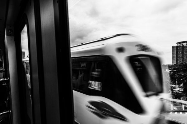 Trains crossing on the train tracks in Kuala Lumpur Malaysia