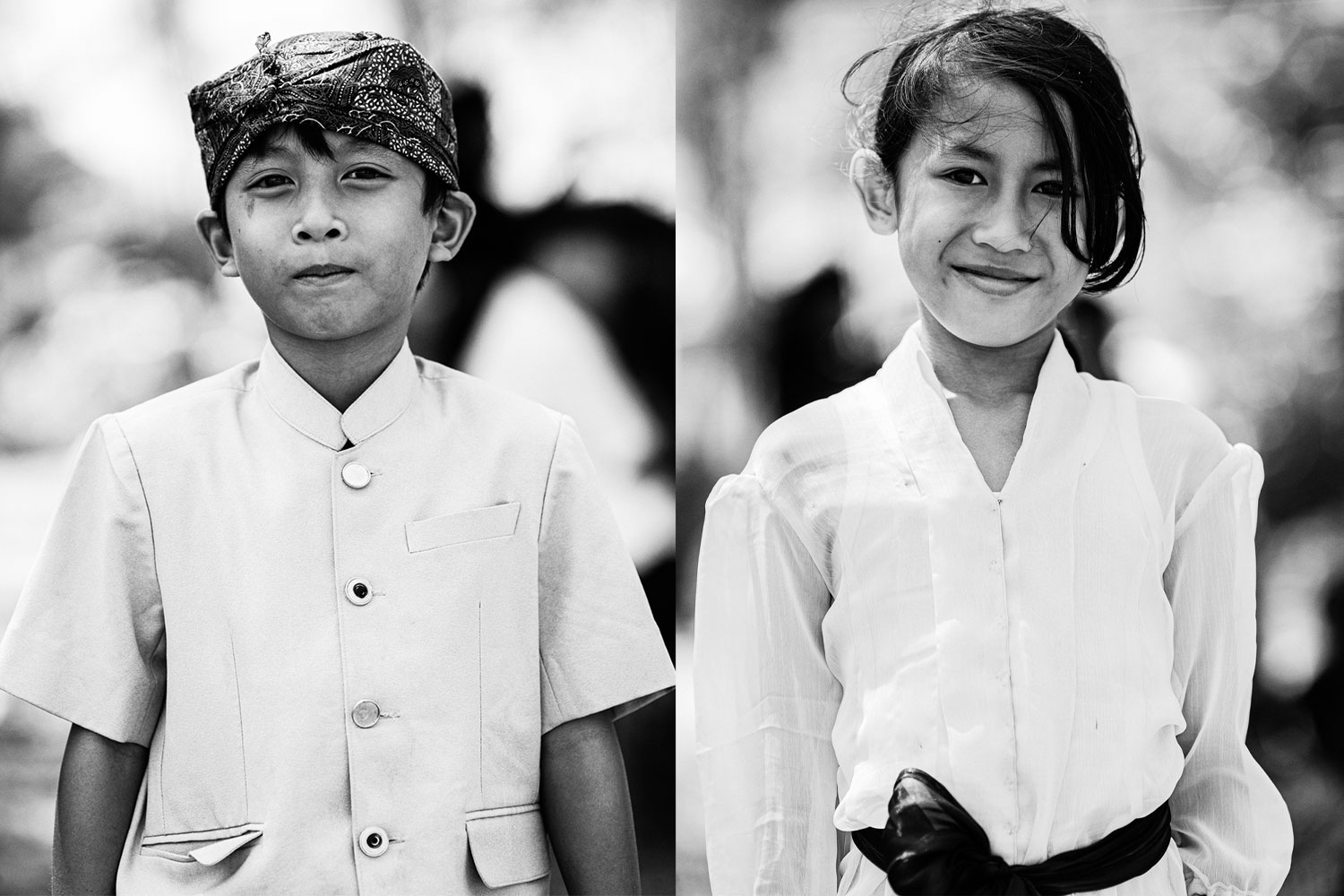 Portrait photo of two young children taken in Bali at a cremation