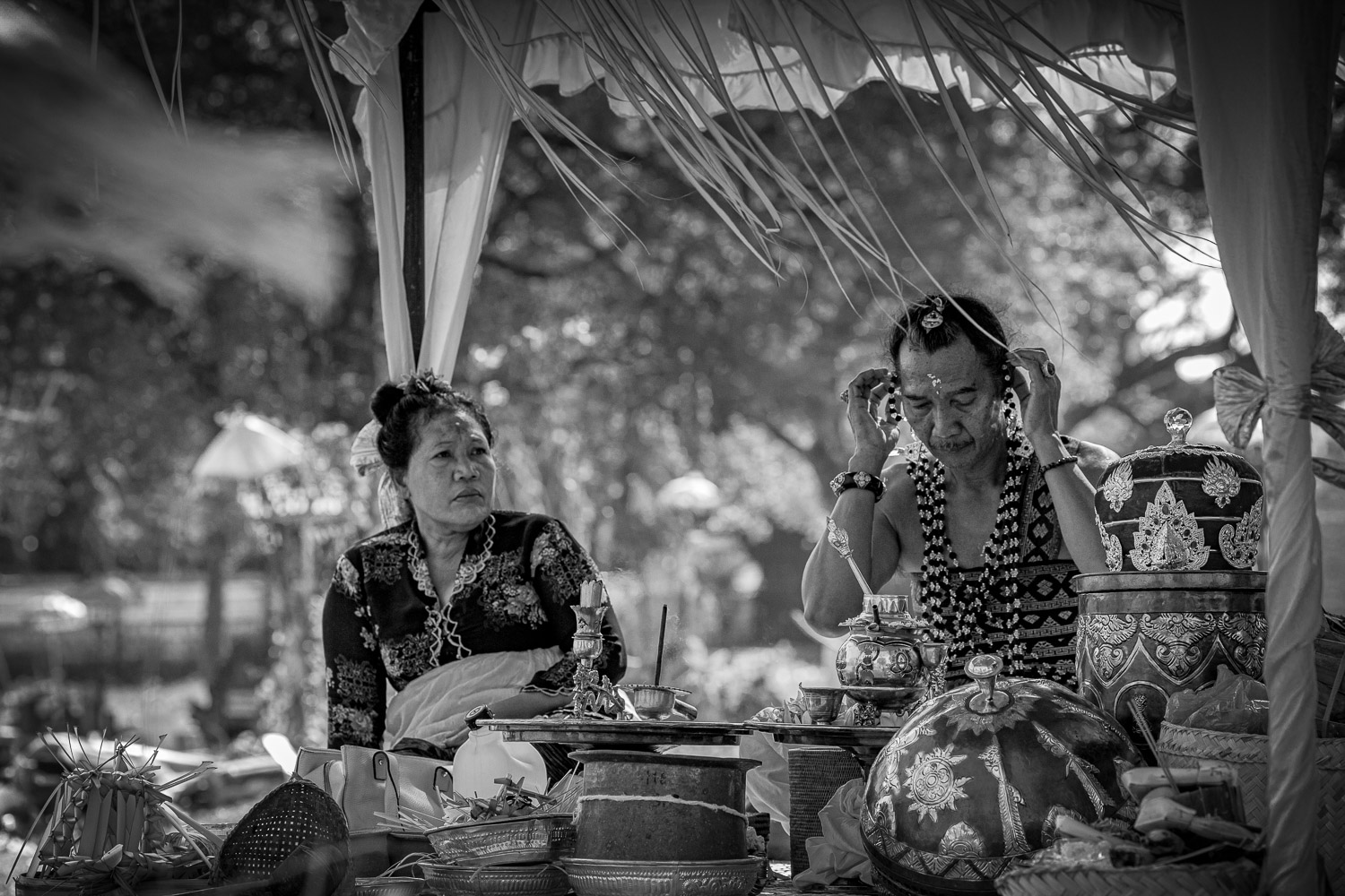 Ngaben cremation in Bali, high priestess and the High Priest preparing for the ritual performance.