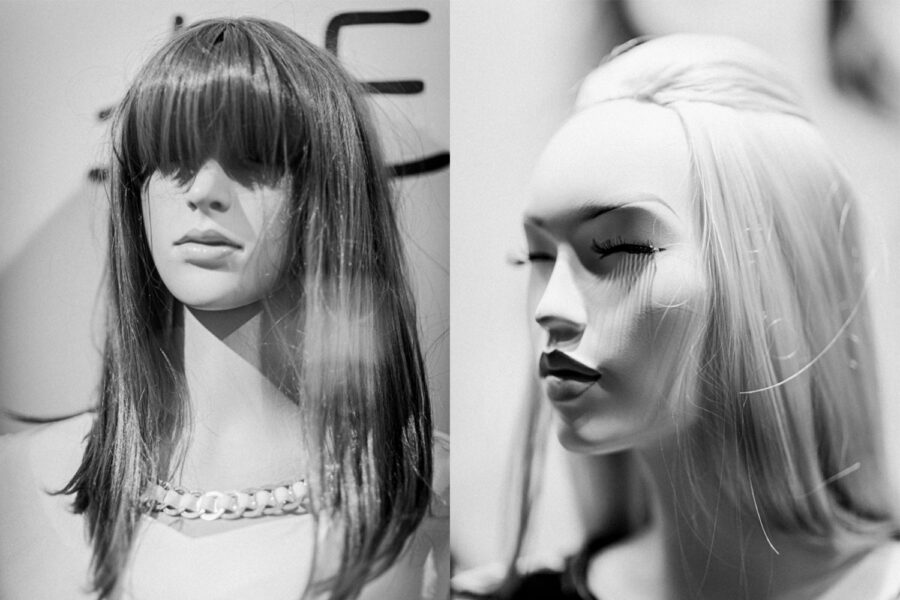 Mannequin modelling a long hair wig black and white photo
