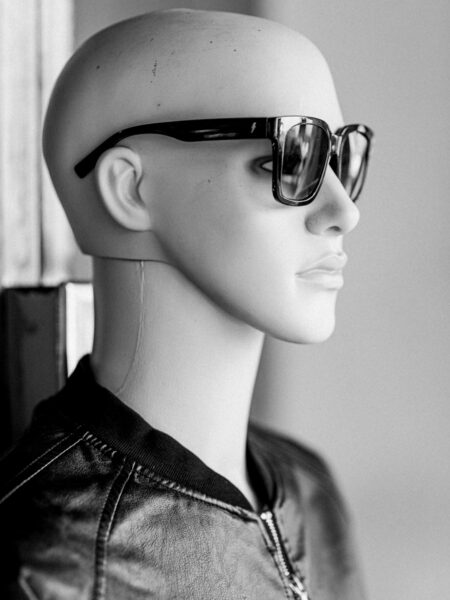 Mannequin with sunglasses black and white photo
