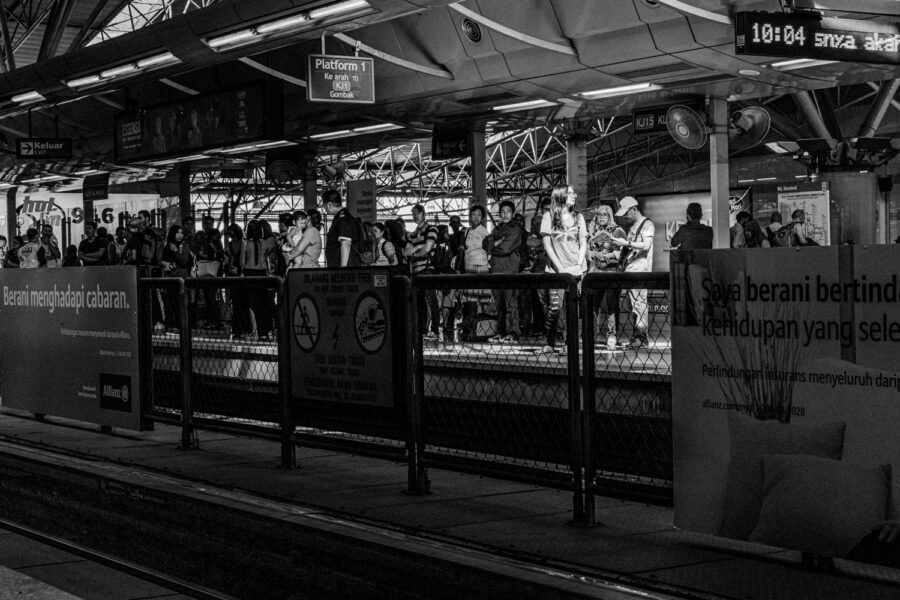 Rail LRT platform passengers waiting for the train to arrive at the LRT platform in Kuala Lumpur, Malaysia