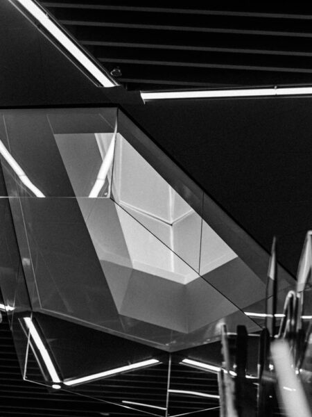 Train station photography black and white photo of stairs and escalator on an MRT platform