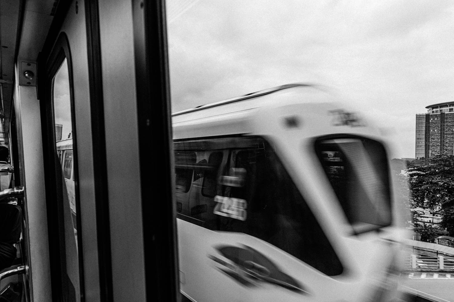 Train Station Photography, trains passing on the train tracks in Kuala Lumpur, Malaysia