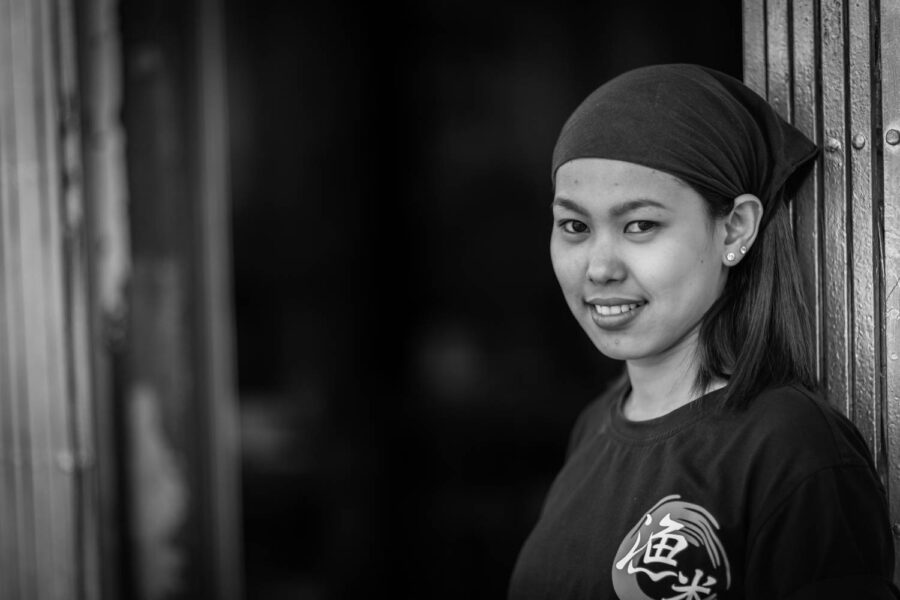 People photography woman outside noodle shop chinatown