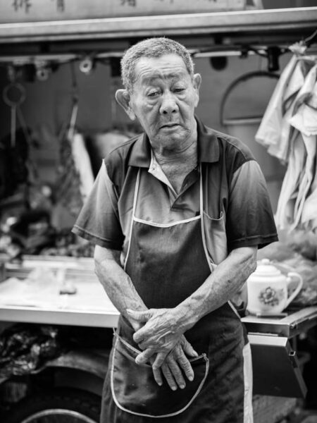 Portrait taken of a food stall operator in Chinatown - Kuala Lumpur