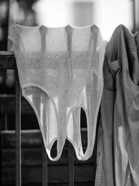 Singlet and shirt hanging from a fence to dry in Little India, Brickfields, Kuala Lumpur – Malaysia