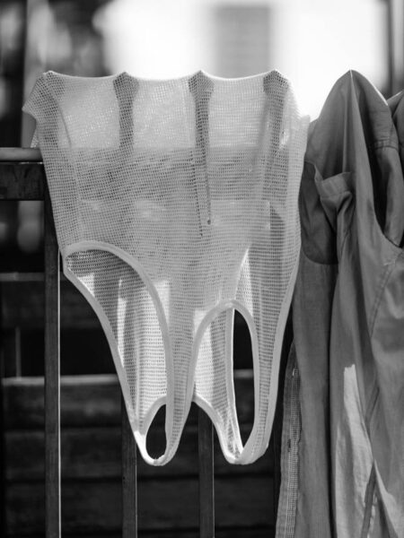 Singlet and shirt hanging from a fence to dry in Little India, Brickfields, Kuala Lumpur – Malaysia