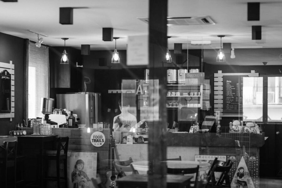 Barista cleaning coffee cups in a cafe in Pasar Seni, Kuala Lumpur - Malaysia