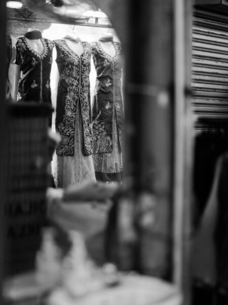 Indian style dresses reflected in a mirror Little India, Brickfields, Kuala Lumpur – Malaysia