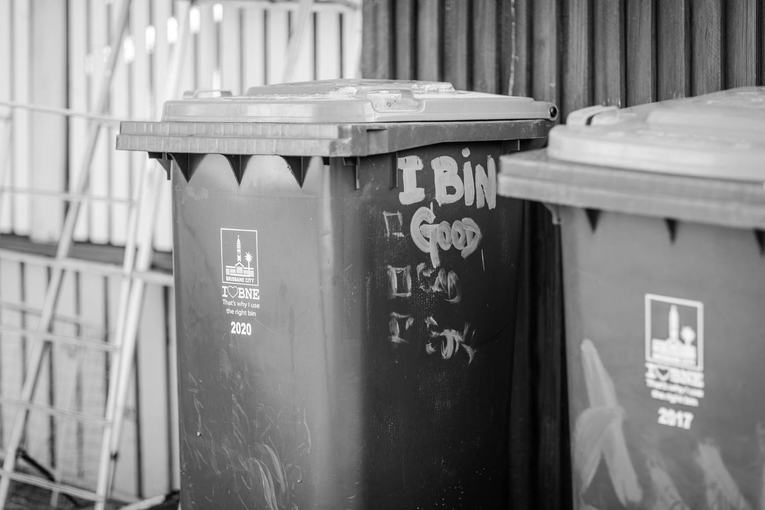 Wheelie bin behaviour checklist black and white photo.