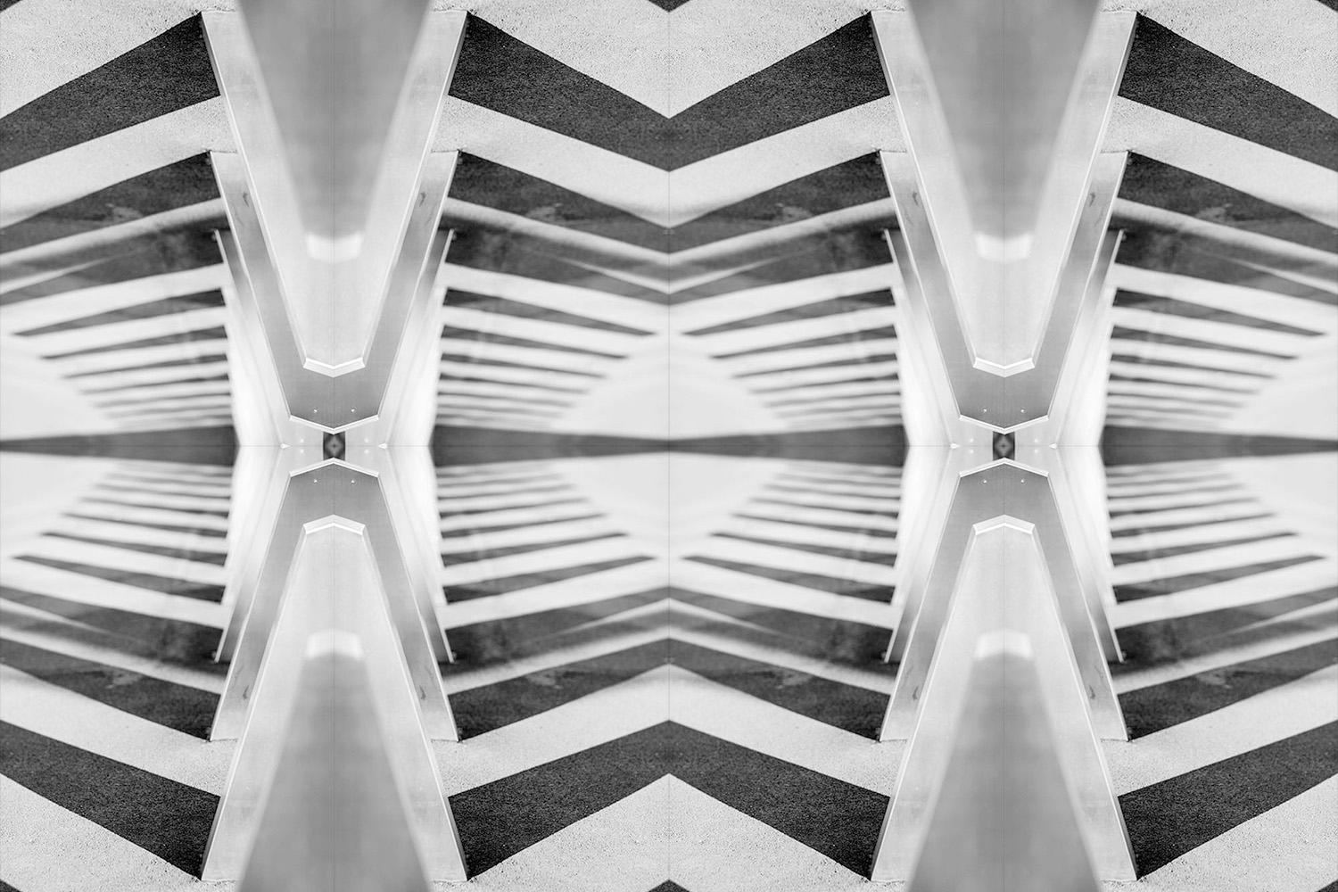 Black and white kaleidoscope artwork.