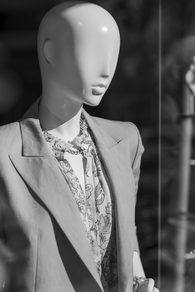 A mannequin wearing a blazer.
