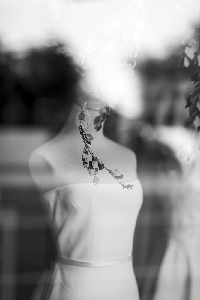 Strapless bridal gown on a shop mannequin.