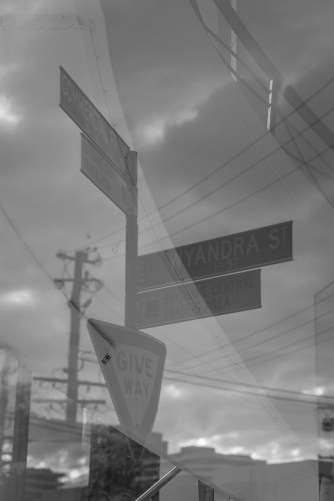 Brisbane street signage reflection on the corner of Commercial Road.