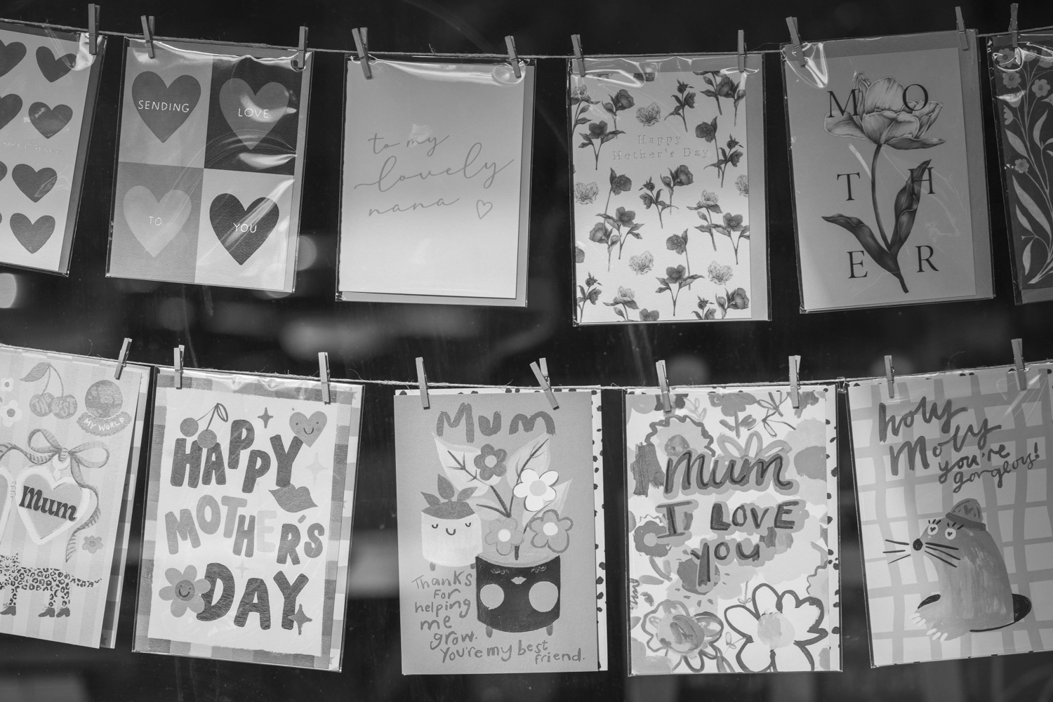Mother’s Day cards and heart motifs displayed in a Newstead shopfront.